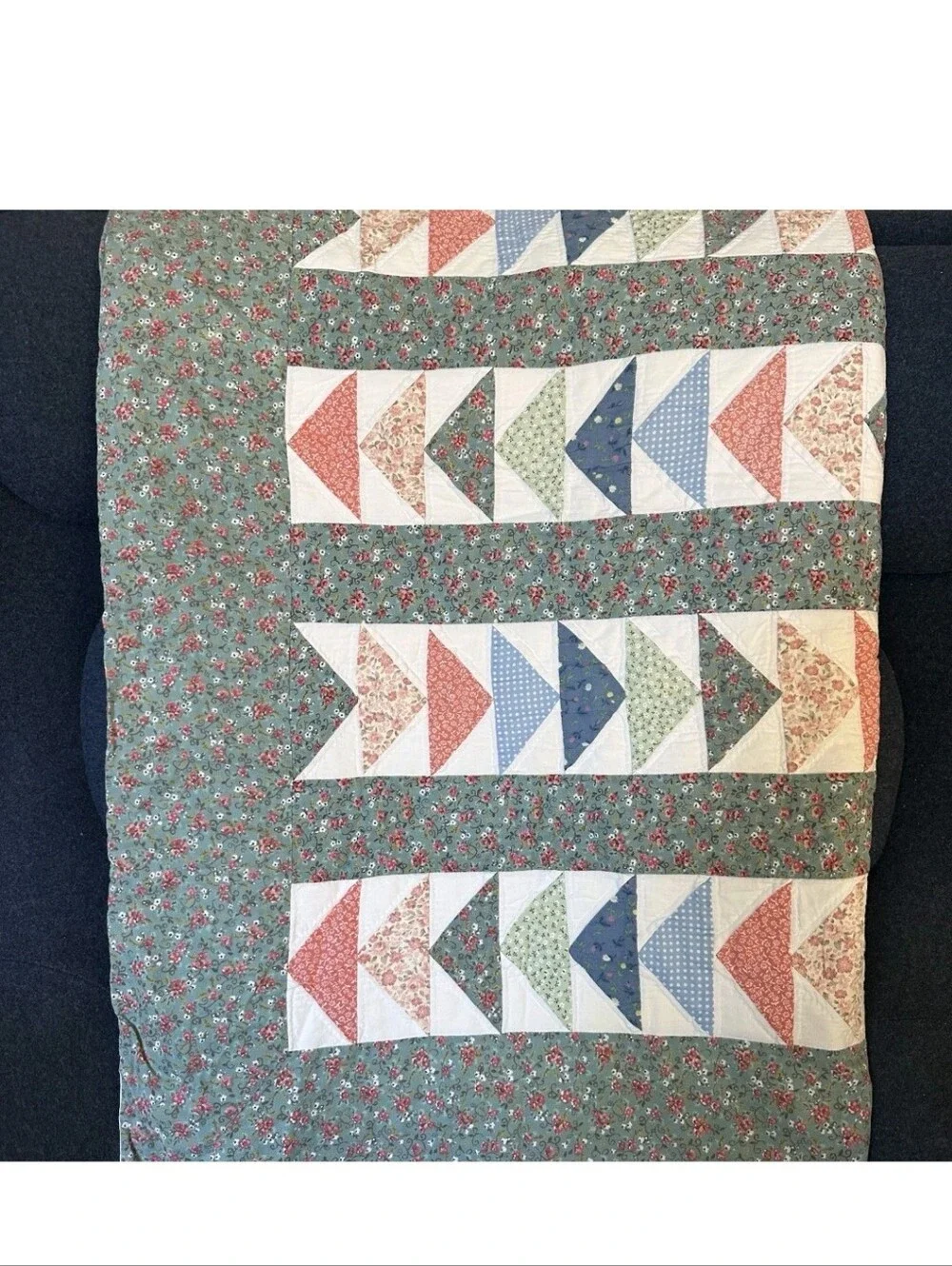 Vintage handmade flying geese quilt